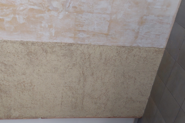 In order to compare the effect of the agro-waste materials use, the wall in question was divided into three different sections: the first one was left as it was, the second one was covered by straw-lime prefabricated blocks, provided by Presspaglia company and the third section was covered by a straw-lime plaster of 10 cm thickness, casted-in-situ, provided by Terrabuilding design company, using a wooden reinforcing as filling control. 