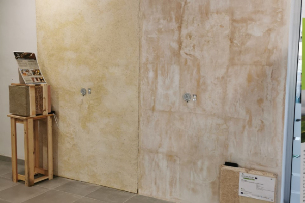 In order to compare the effect of the agro-waste materials use, the wall in question was divided into three different sections: the first one was left as it was, the second one was covered by straw-lime prefabricated blocks, provided by Presspaglia company and the third section was covered by a straw-lime plaster of 10 cm thickness, casted-in-situ, provided by Terrabuilding design company, using a wooden reinforcing as filling control. 